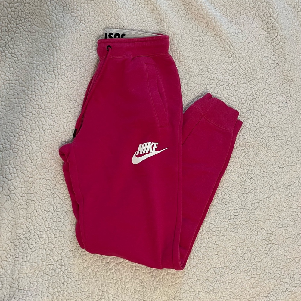 Hot pink women’s Nike sweats